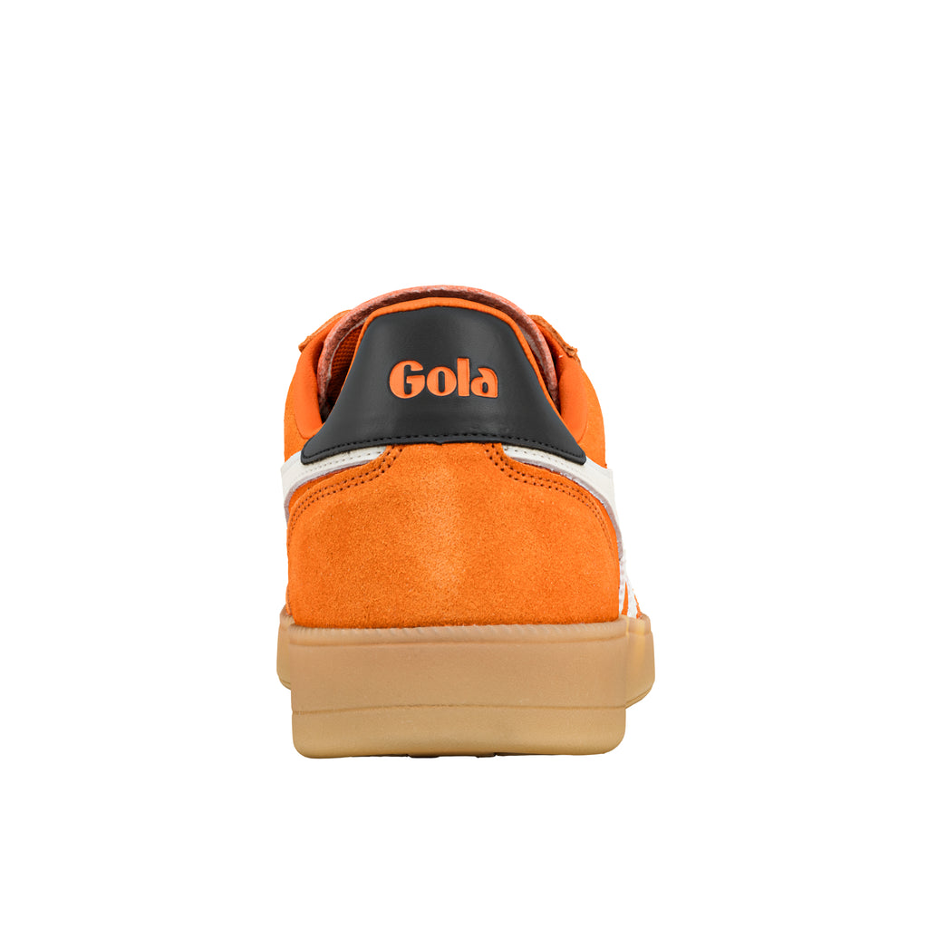Rear view of an orange suede Gola trainer with a black heel tab and gum sole