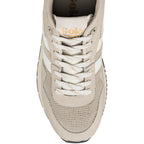 Top view of a beige Gola trainer with white laces and mesh detailing