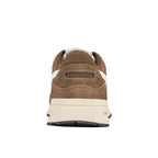 Rear view of a brown suede trainer with a cream midsole and black rubber sole