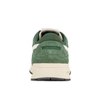 Rear view of a green suede trainer with a cream midsole