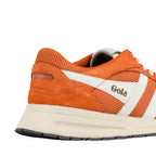 Close up of orange and white Gola trainer heel with suede and mesh panels
