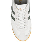 White Gola trainer with dark green side stripes and gum sole