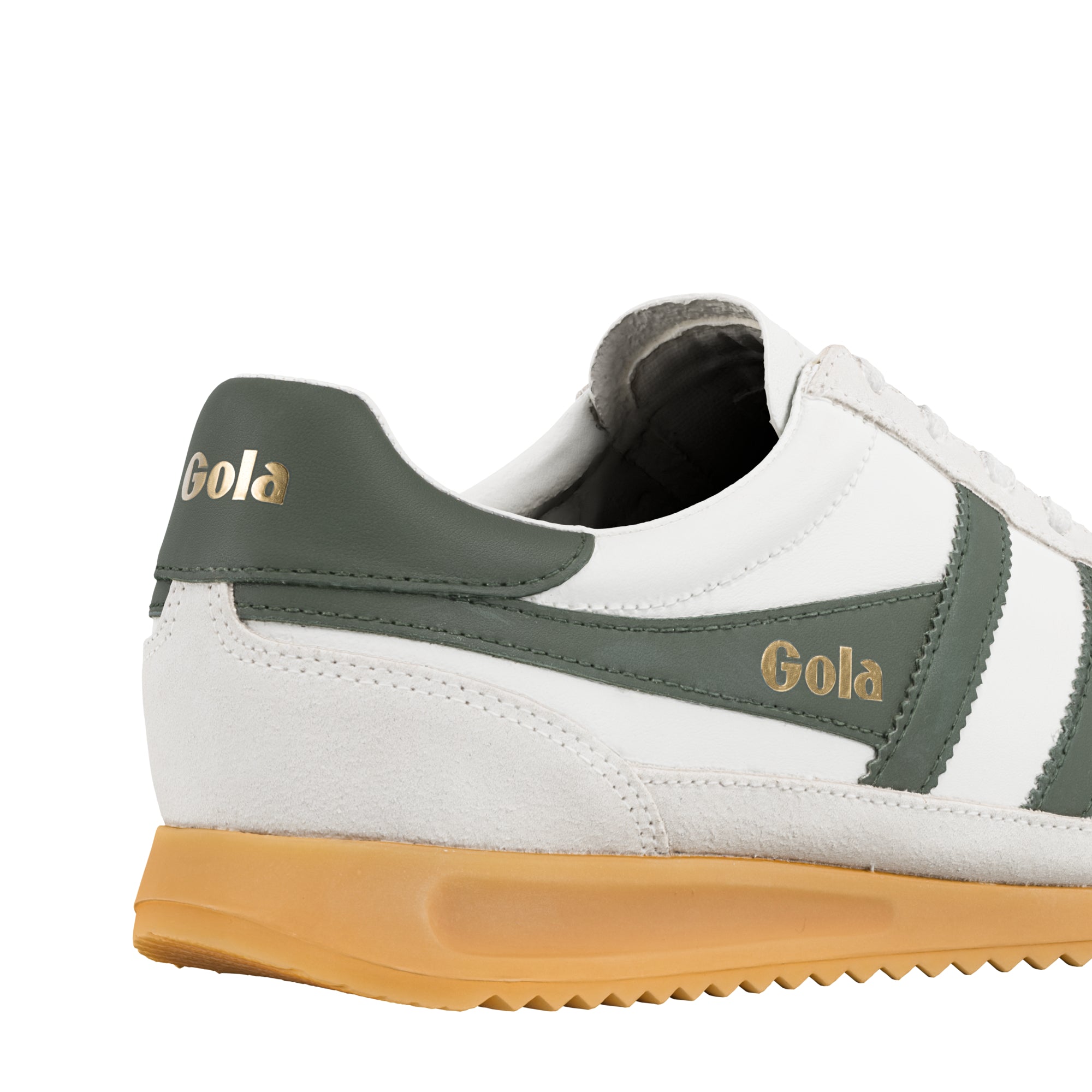 White and dark green Gola trainer with a gum sole