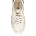 Top view of a cream coloured Gola trainer with lace up fastening