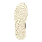 Cream coloured rubber trainer sole with herringbone tread pattern and Gola branding
