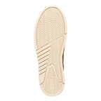 Cream coloured rubber trainer sole with herringbone tread pattern and Gola branding