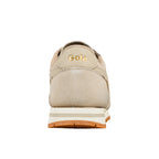 Rear view of a beige Gola trainer with a gum rubber sole