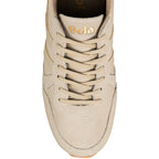 Top view of a beige suede Gola trainer with matching laces