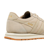 Beige suede Gola trainer with gold branding on the heel and side panel