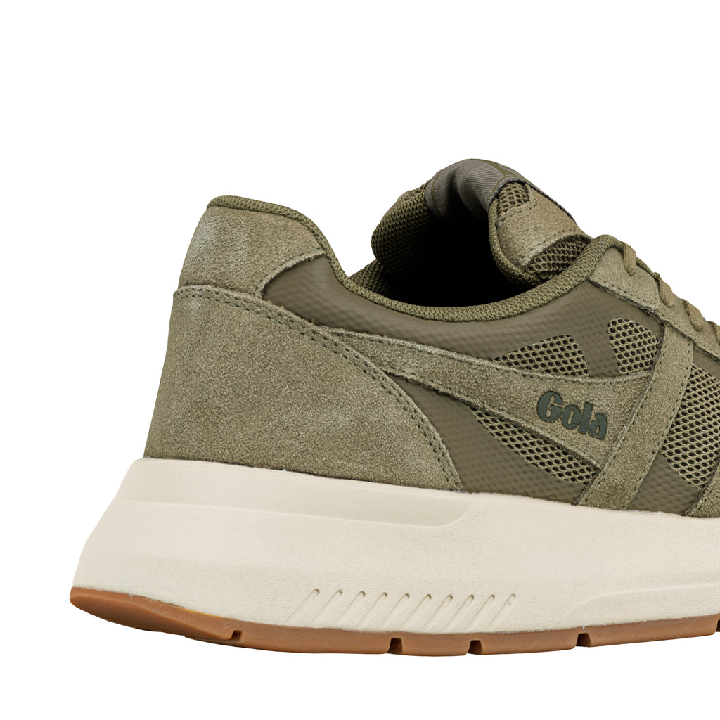Close up of the heel and side of an olive green Gola trainer with a cream sole and gum tread