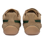 Pair of tan suede trainers with green stripes on the heel, rear view