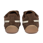 Pair of brown suede trainers with white stripes and tan soles, rear view
