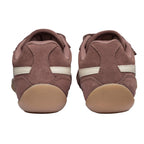 Pair of brown suede trainers with white stripes and tan soles, rear view