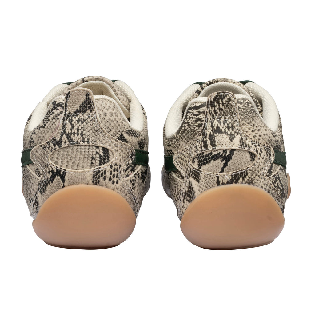 Rear view of two trainers with snakeskin pattern, green stripe, and light brown soles