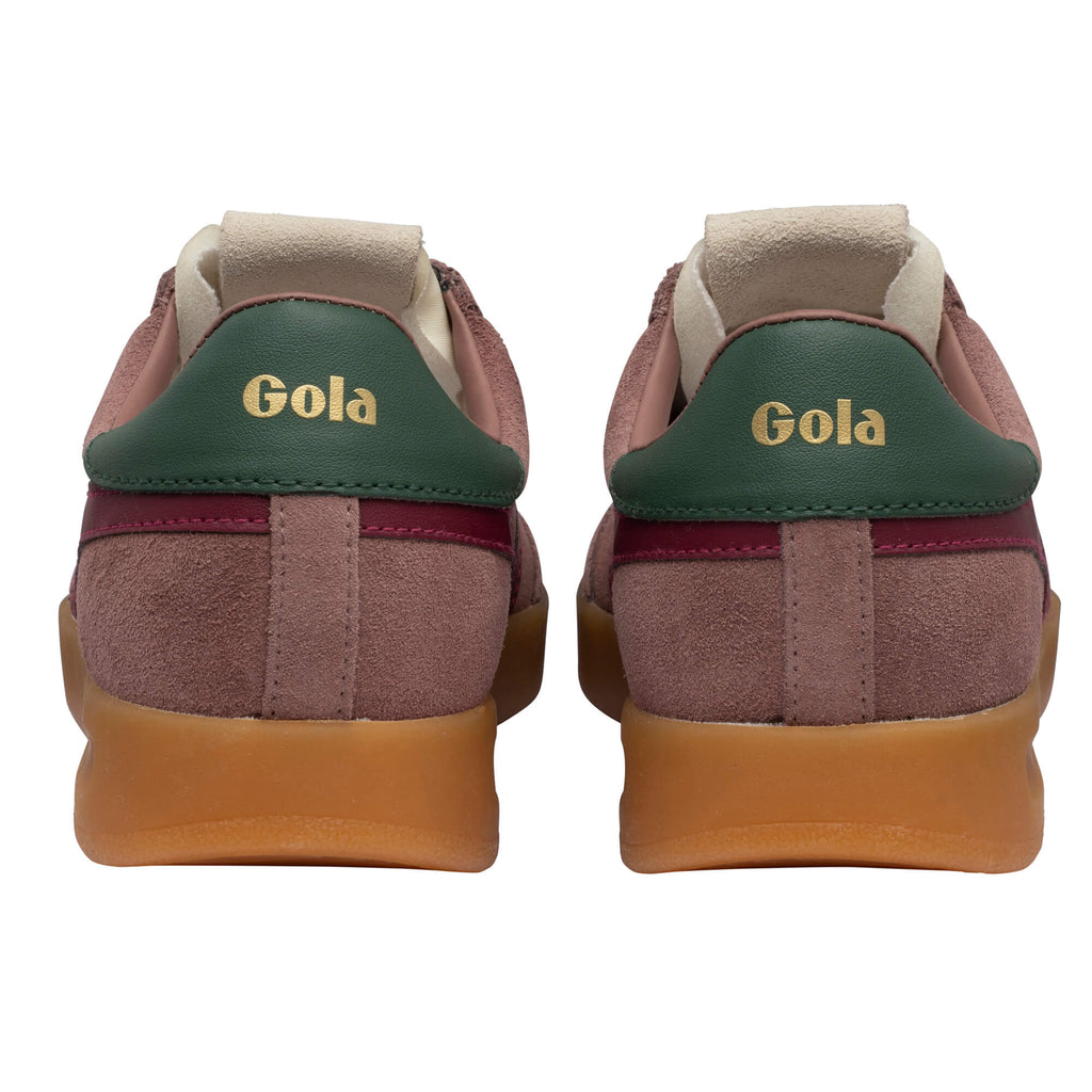 Pair of Gola trainers, rear view, in pink suede with green and burgundy accents and a gum sole