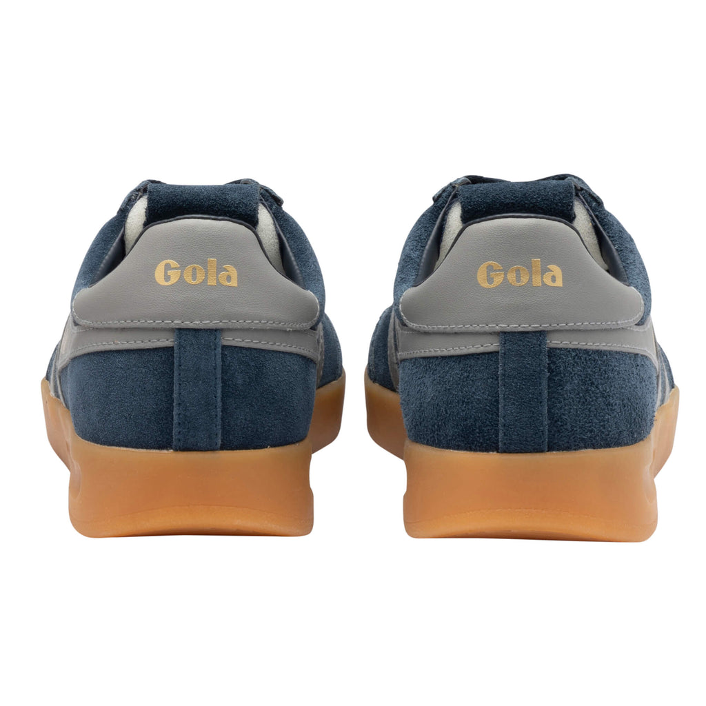Rear view of two navy blue Gola trainers with grey heel tabs and gum soles
