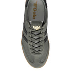 Top-down view of a grey Gola trainer with black stripes and a brown sole