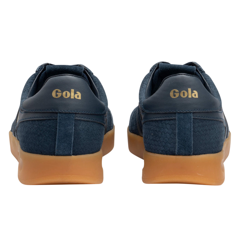 Rear view of two navy blue Gola trainers with tan soles