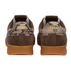 Rear view of two brown Gola trainers with snakeskin print and gum soles
