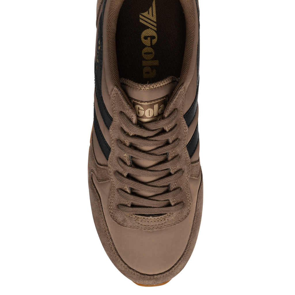 Top-down view of a Gola trainer in brown with black stripes and laces