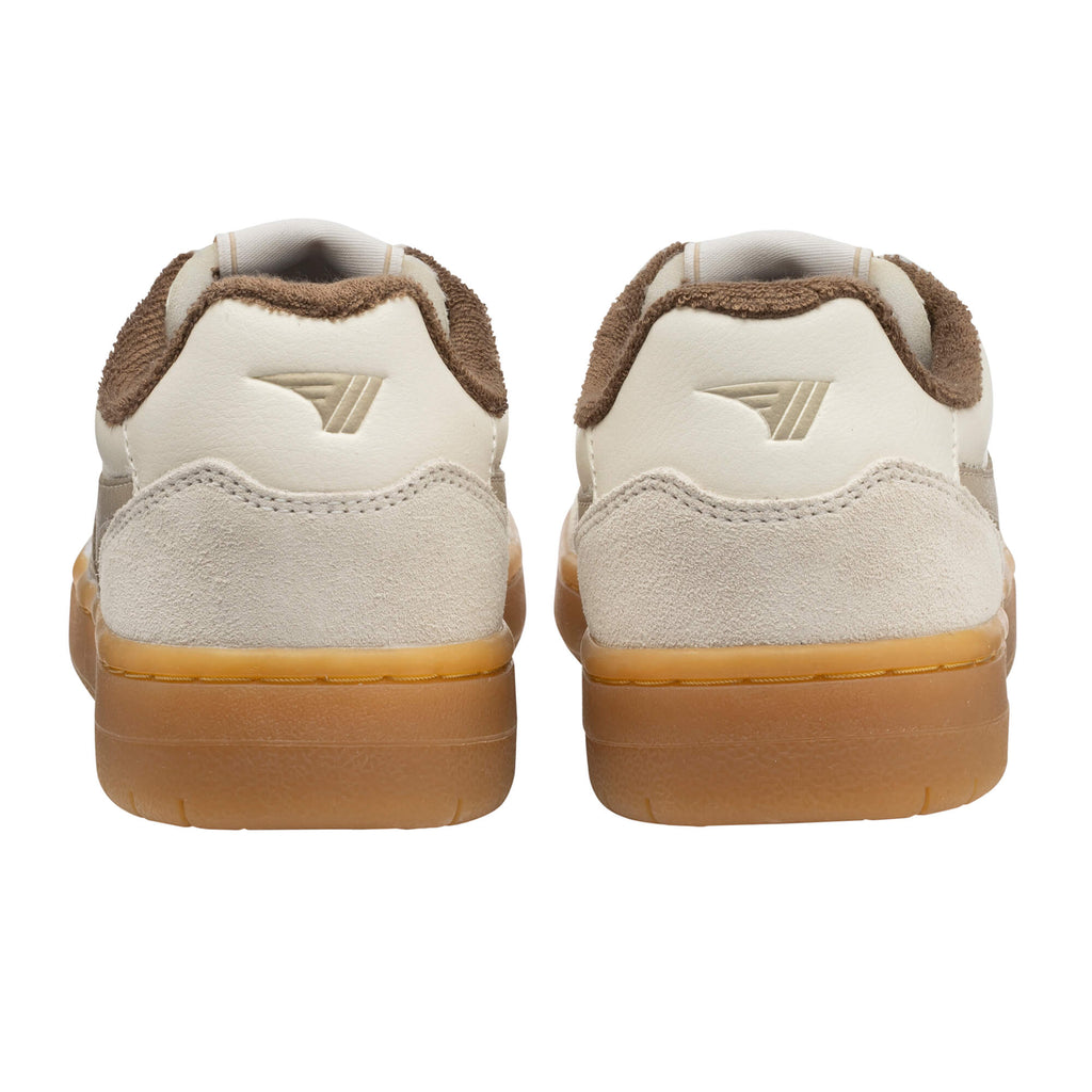 Pair of beige and brown trainers, rear view