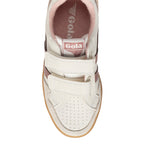 Top-down view of a white Gola trainer with pink accents and two hook-and-loop straps