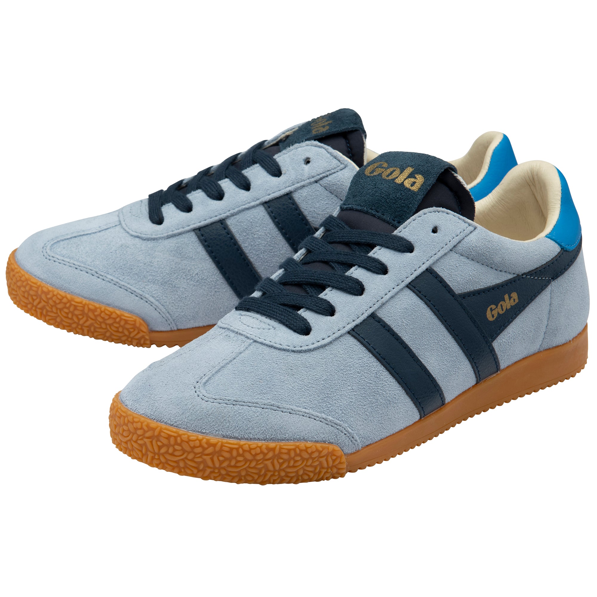Pair of light blue trainers with dark blue stripes and brown soles on a white background