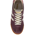 Top-down view of a Gola Harrier trainer in plum suede with white stripes and laces