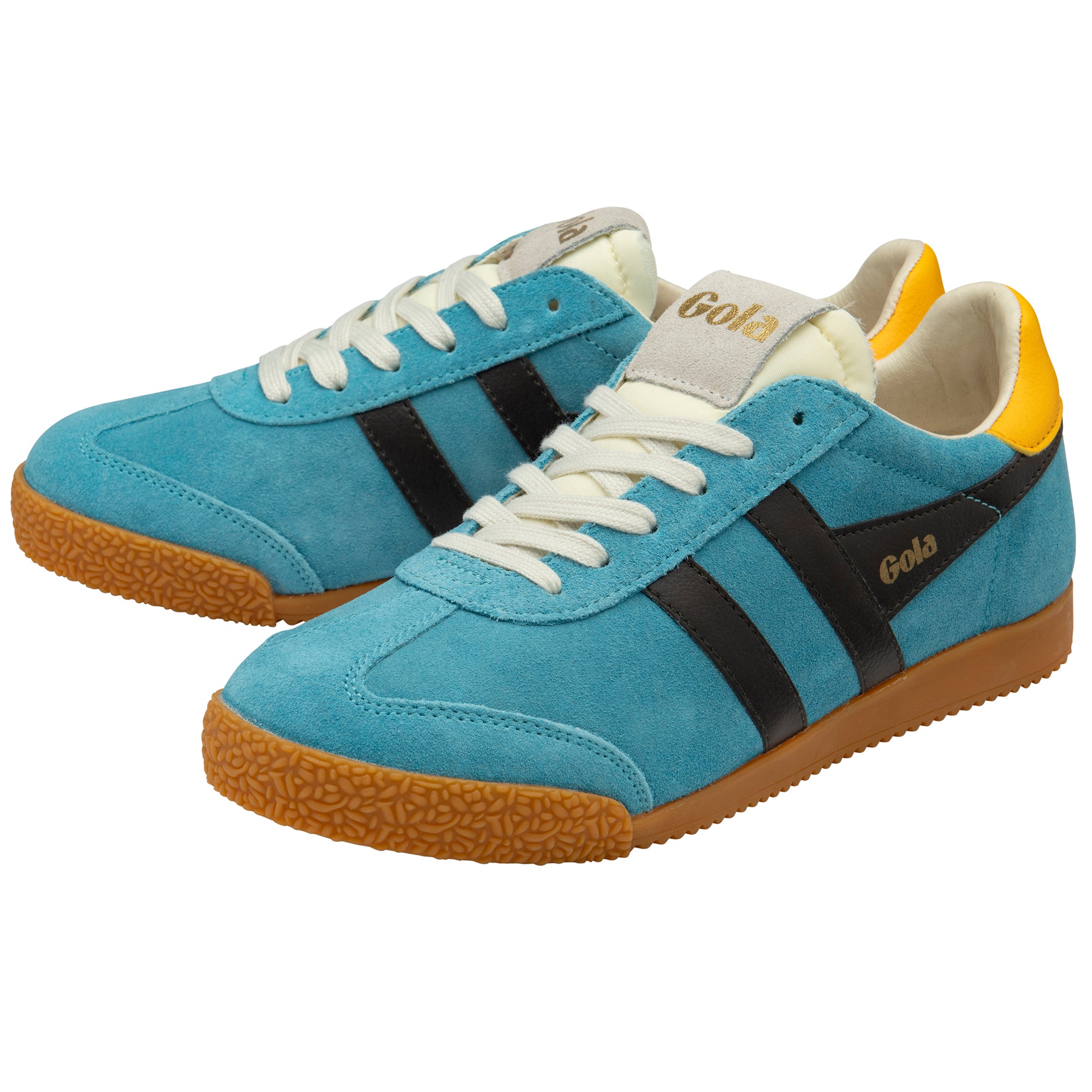 Blue trainers with black stripes and brown soles on a white background