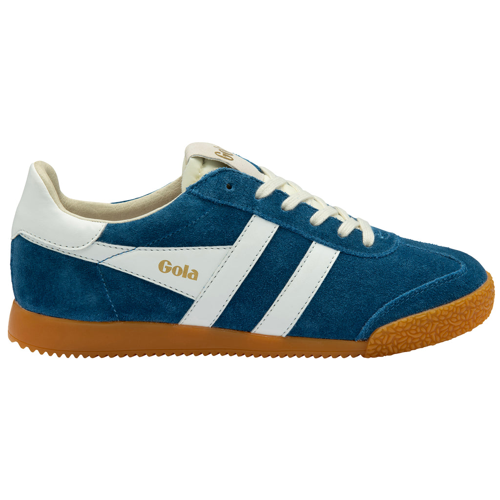 Blue and white trainer with brown sole on a white background