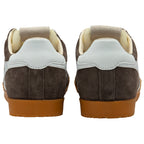 Back view of brown suede trainers with white soles on a white background