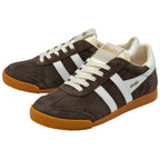 Pair of brown trainers with white laces and soles on a white background