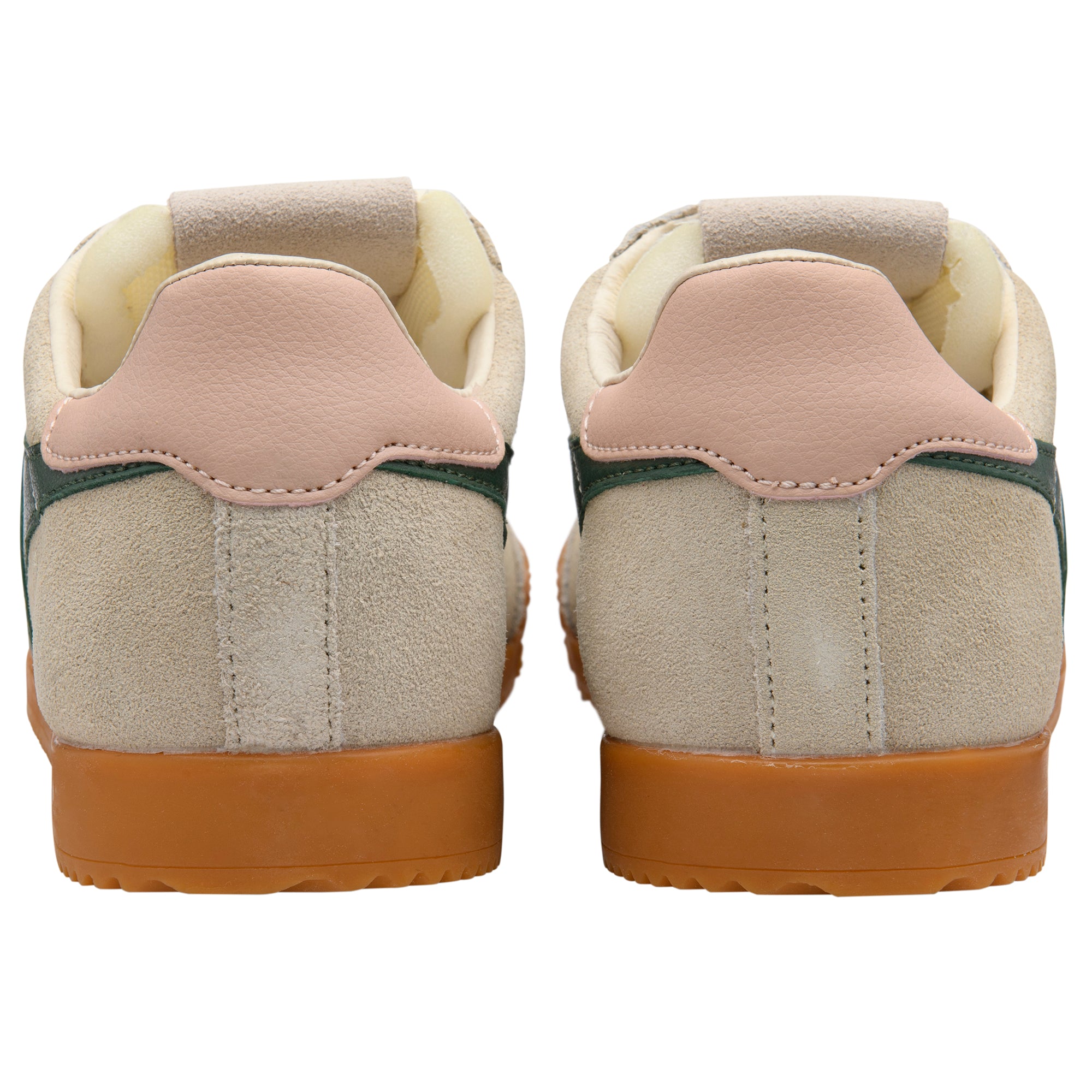 Pair of beige trainers with brown soles on a white background