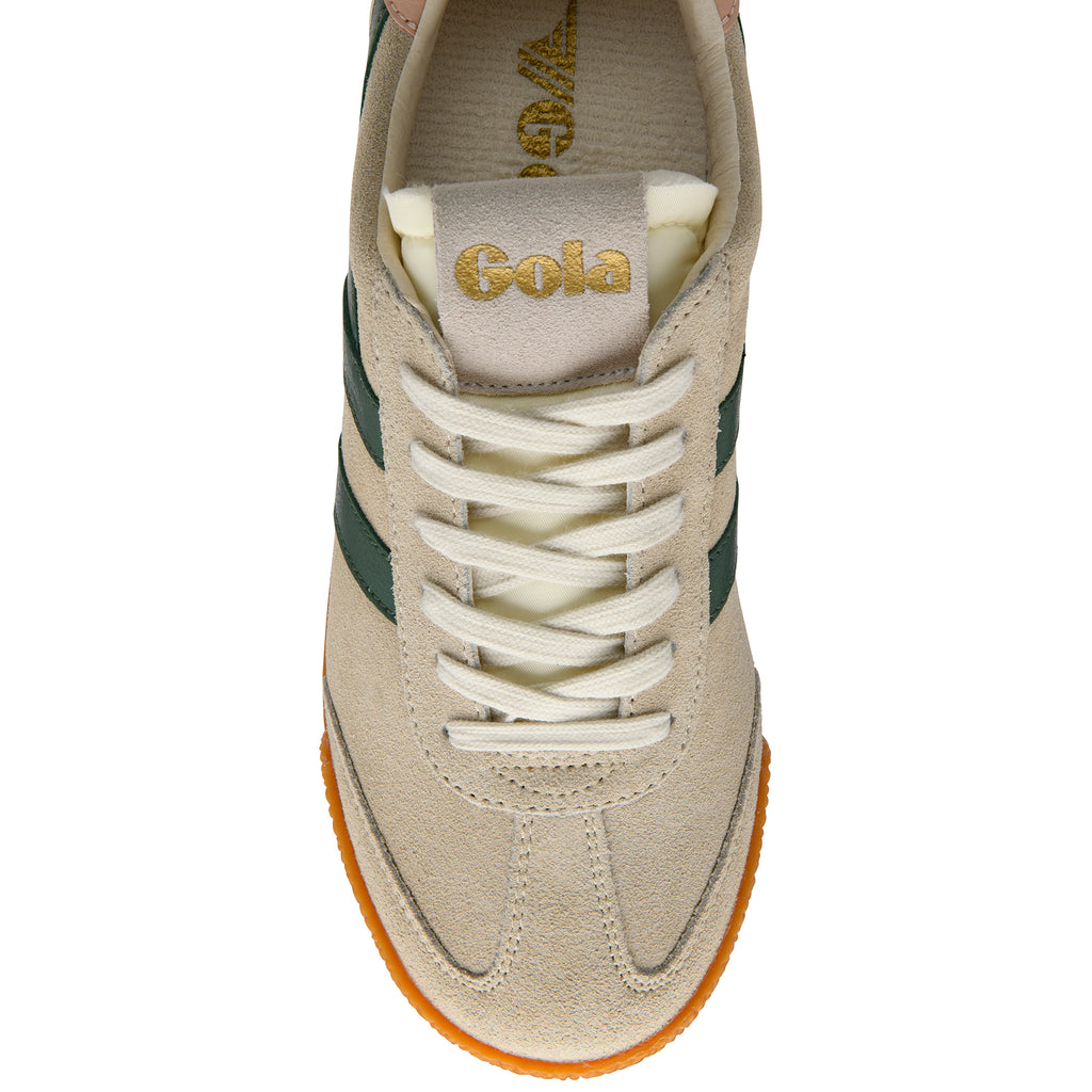 Beige trainer with white laces and green stripe on a white background