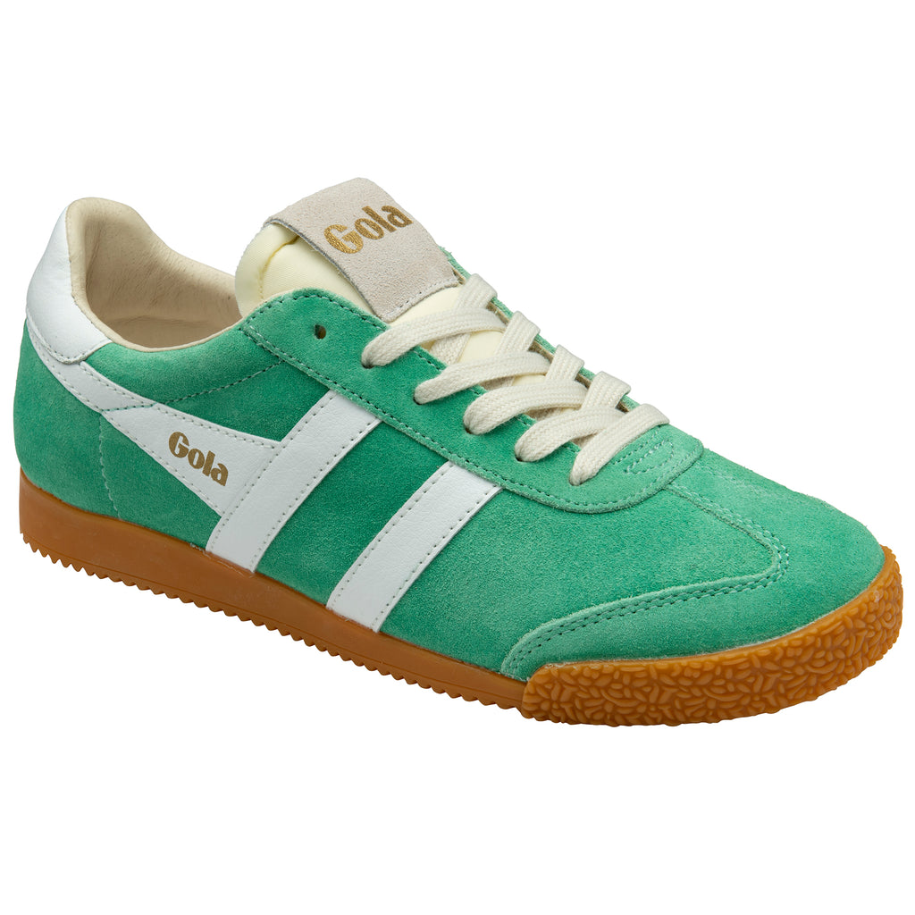 Green trainer with white accents on a white background