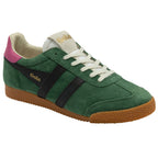 Green trainer with black stripes and brown sole on a white background
