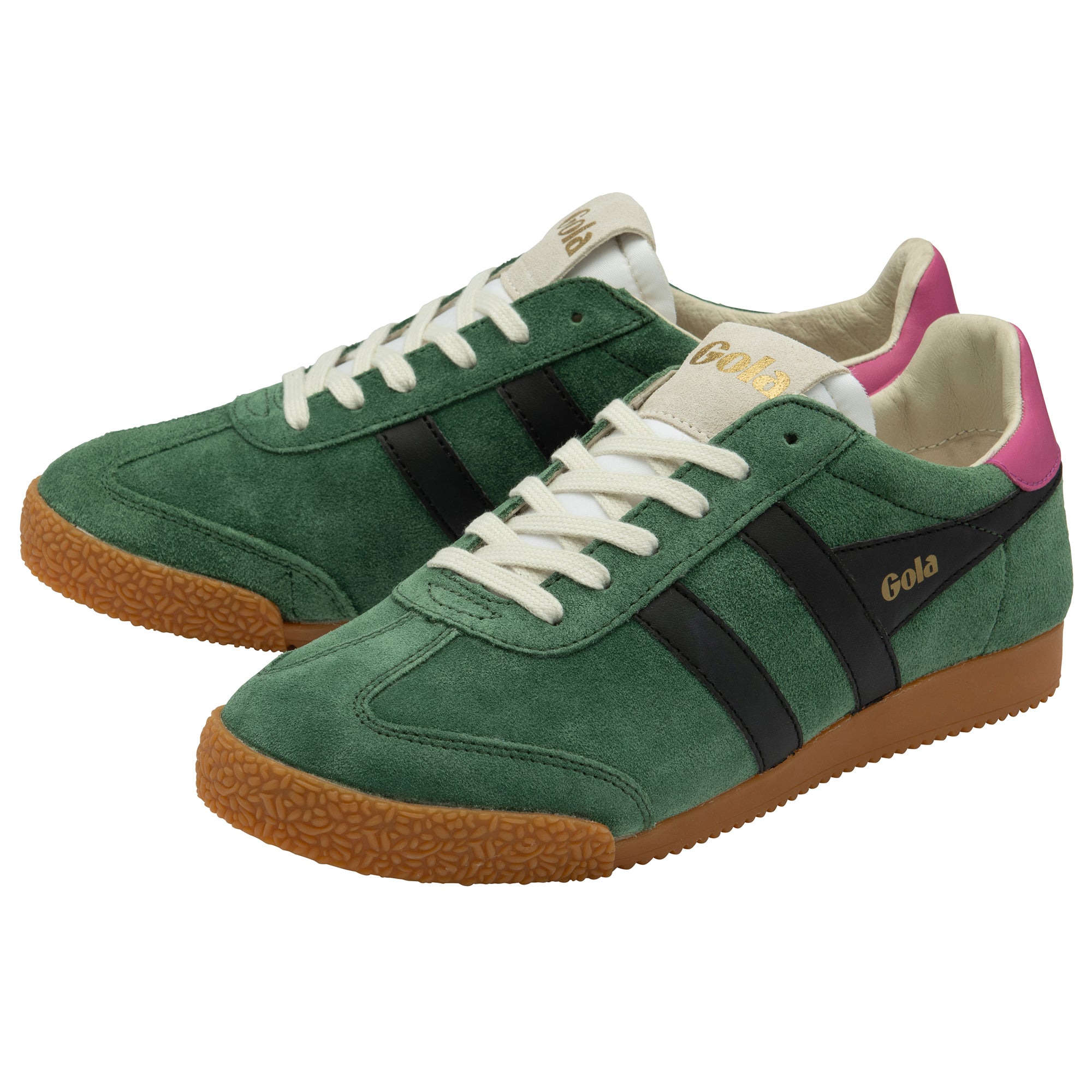 Green trainers with black stripes and brown soles on a white background