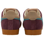 Pair of maroon trainers with brown soles and beige accents on a white background