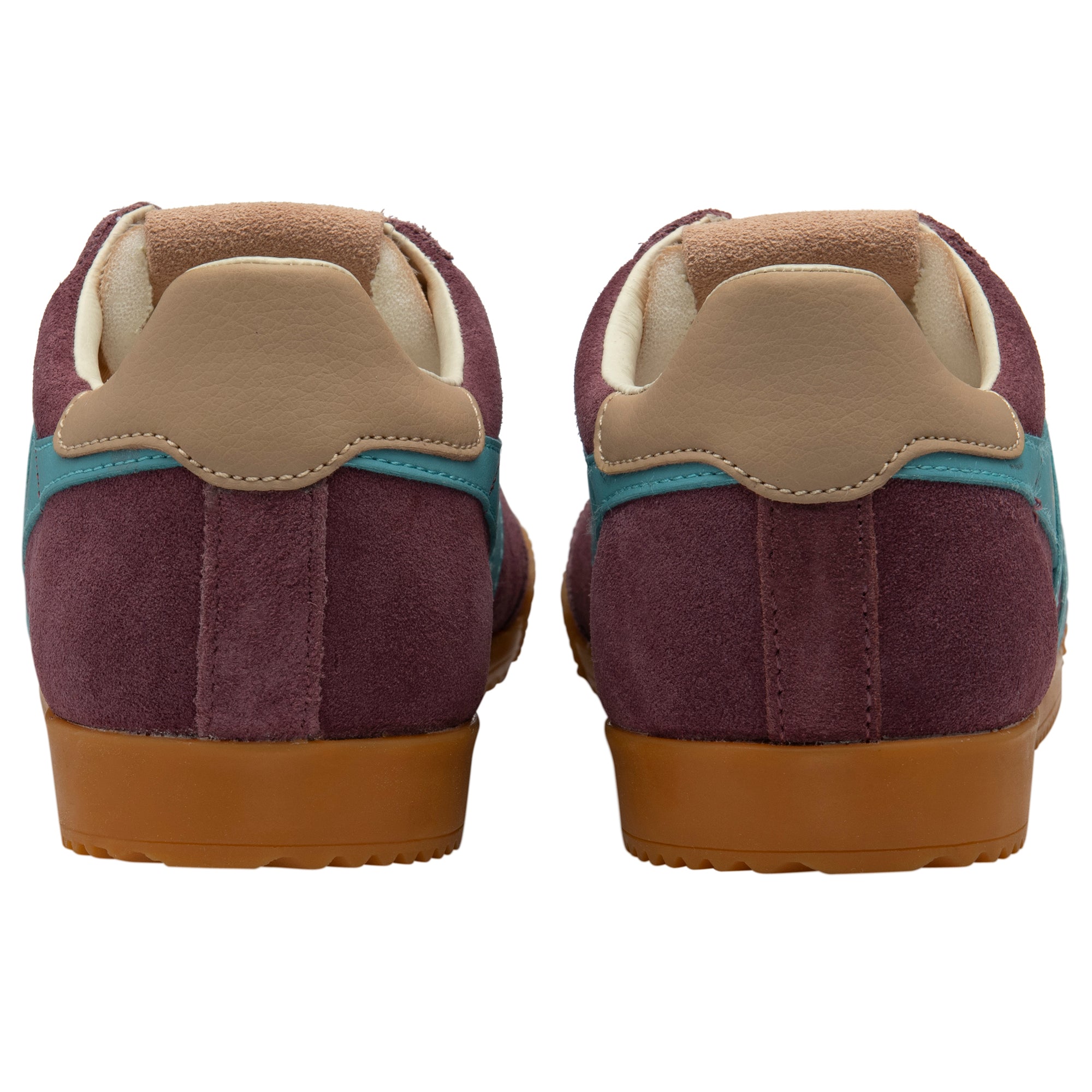 Pair of maroon trainers with brown soles and beige accents on a white background