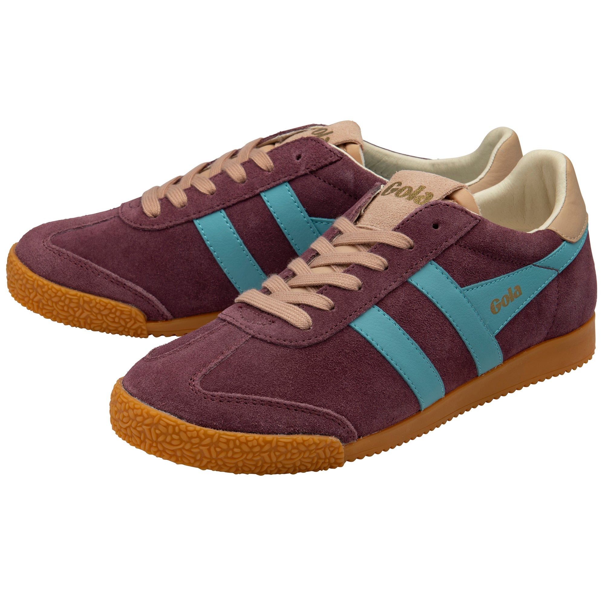 Pair of maroon trainers with blue stripes and brown soles on a white background