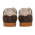 Pair of brown suede trainers with tan soles, rear view