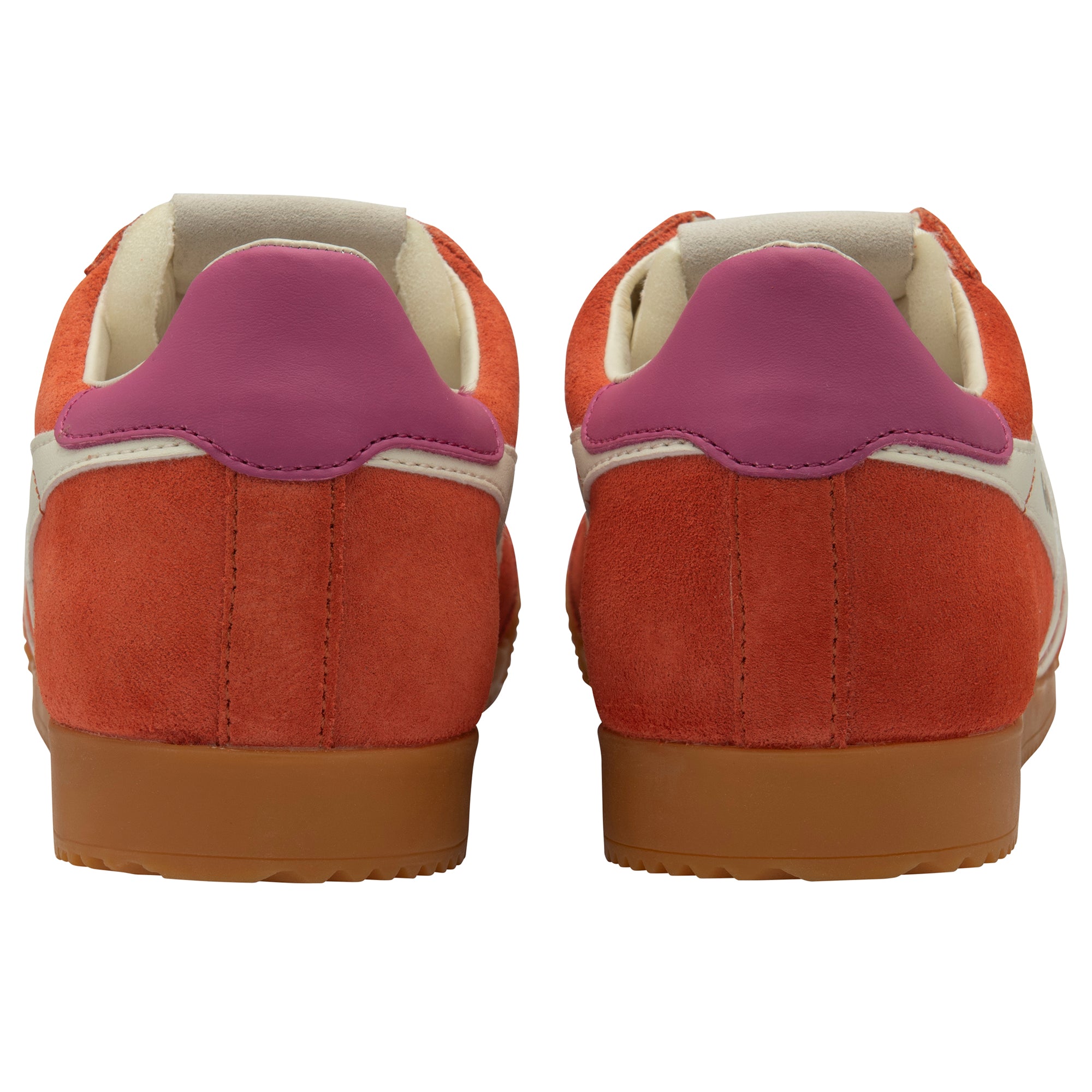 Pair of orange trainers with purple heel on a white background