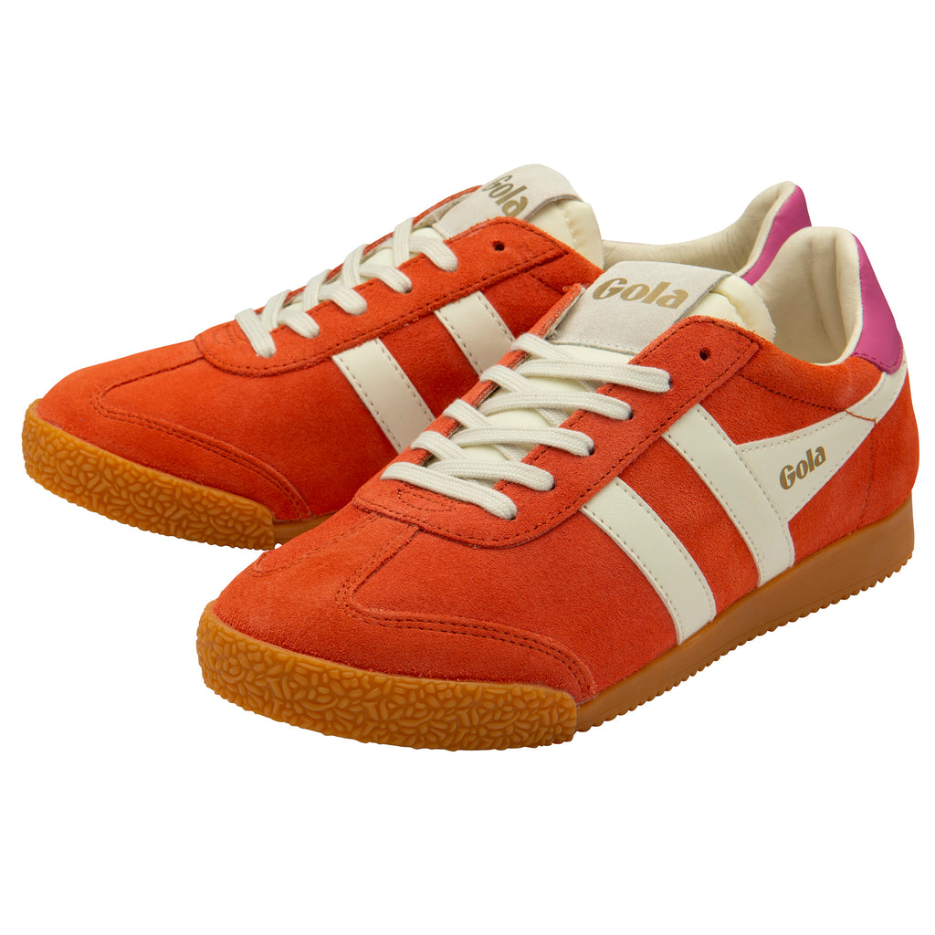 Orange trainers with white stripes and brown soles on a white background
