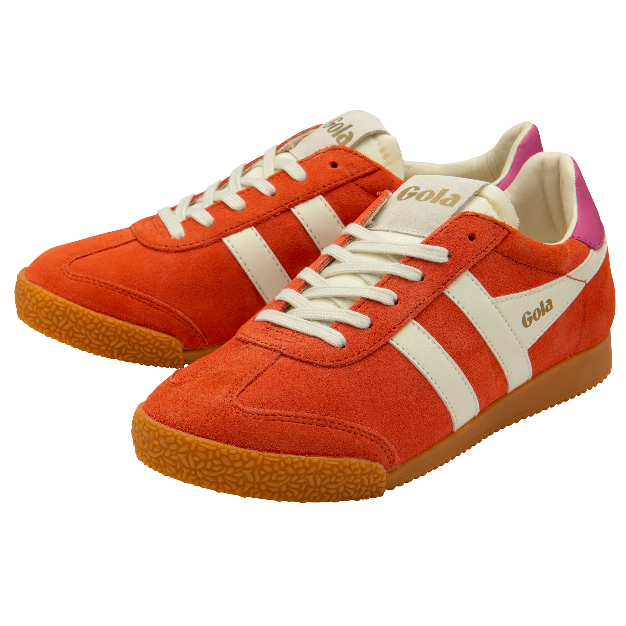 Orange trainers with white stripes and brown soles on a white background