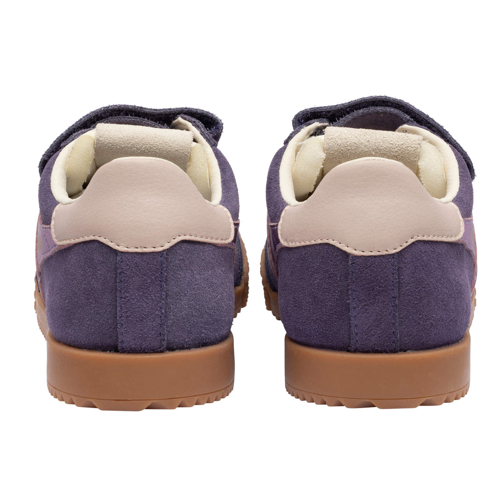 Pair of purple suede trainers with beige heels and brown soles