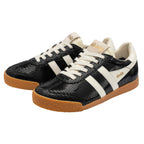 Pair of Gola Harrier trainers in black faux snakeskin with white stripes and gum sole