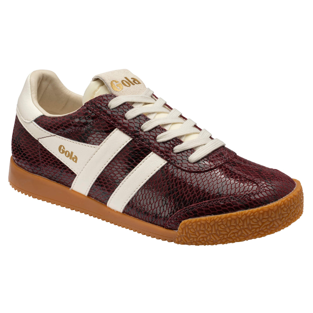 Gola women's trainer in burgundy faux snakeskin with white stripes and a gum sole