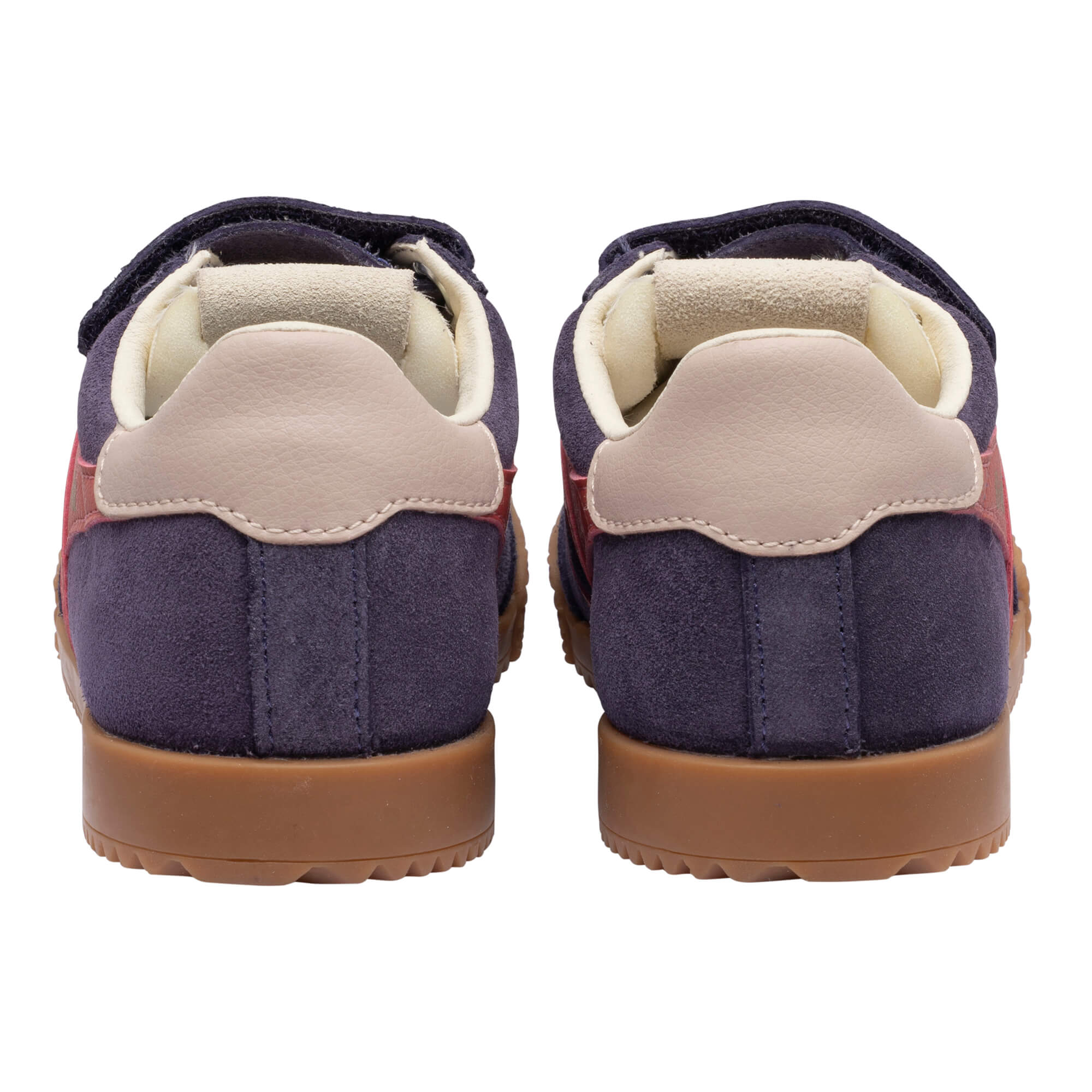 Pair of navy blue suede trainers with red accents and tan soles, viewed from the back