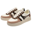 Pair of Gola trainers in cream, brown, and leopard print