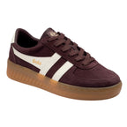 Gola women's trainer in burgundy suede with white stripes and a gum sole